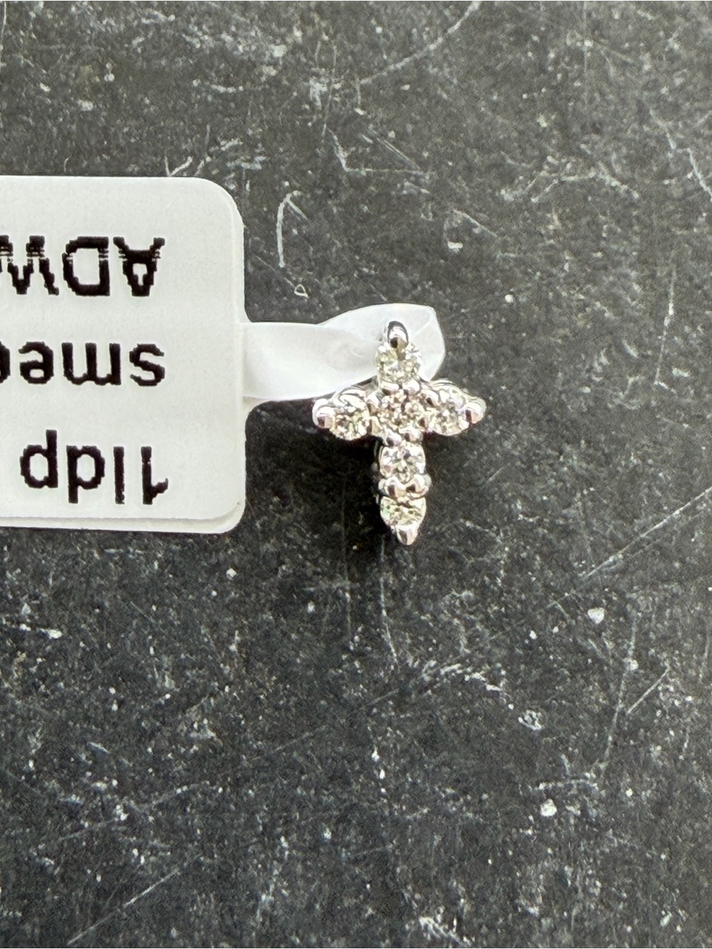 14kt white gold diamond cross .06 carats